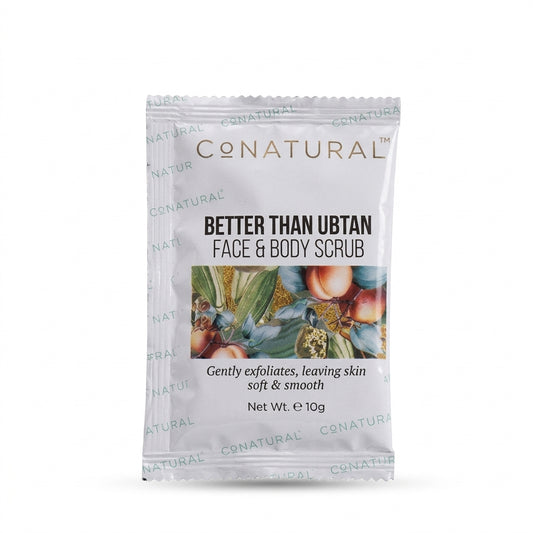 A single packet of CONatural Better Than Ubtan Face & Body Scrub, 10g, on a plain white background.