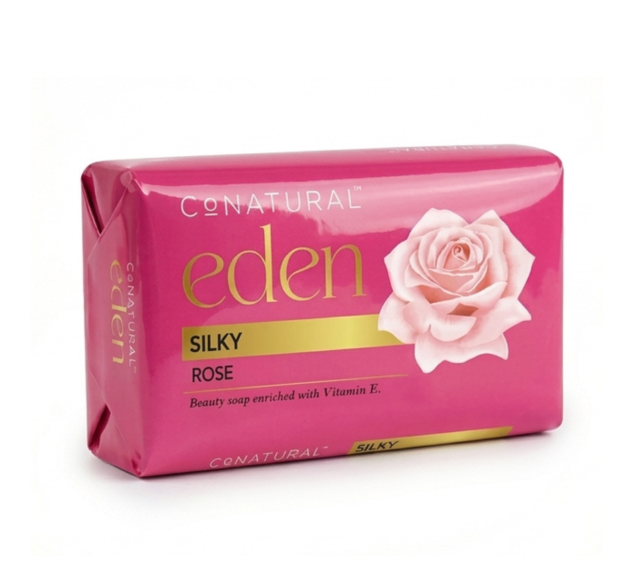 A pink rectangular bar of ConNatural Eden Silky Rose soap, featuring a large pink rose graphic and gold lettering, set against a plain white background.