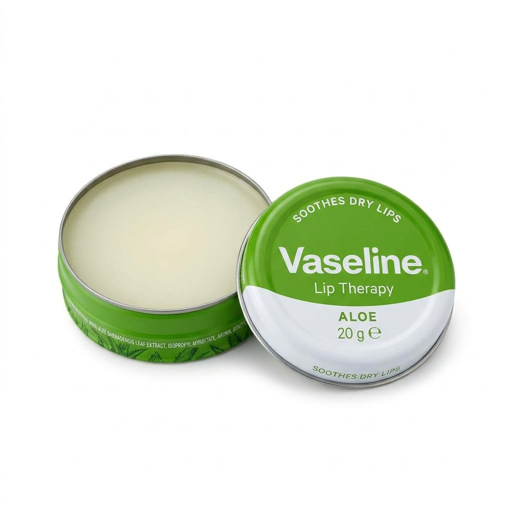 Vaseline Aloe lip balm in a round green tin, with the lid placed beside the open container showing the balm inside, on a white background.