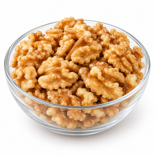 Shelled walnut kernels in clear glass bowl