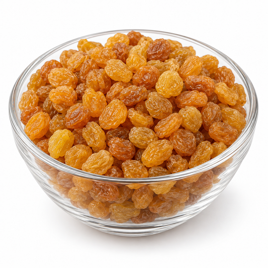 Round golden raisins in a glass bowl