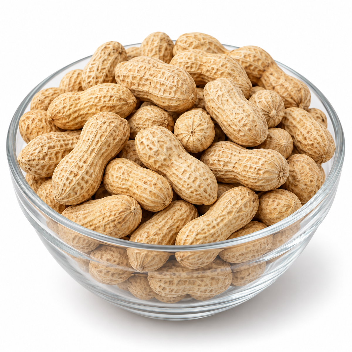 Whole peanuts in shells in a glass bowl