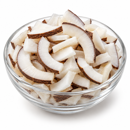 Dried coconut pieces in a glass bowl