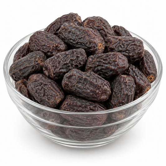 Black dried dates chuwara in a glass bowl