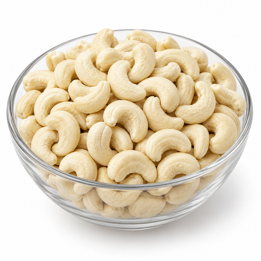 Whole raw cashew nuts grade 320 in a glass bowl
